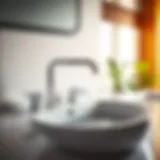 Elegant bathroom sink faucet with pop-up drain mechanism showcasing modern design