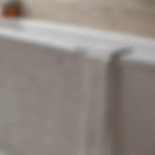 Close-up view of caulk bathroom tape application on a bathtub edge