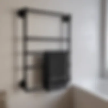 Stylish flat black towel rack enhancing minimalist decor