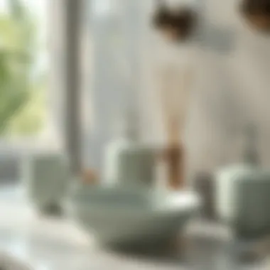Close-up of sage bathroom accessories and decor elements creating a serene atmosphere