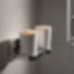 Sleek wall mounted cup holder in a modern bathroom