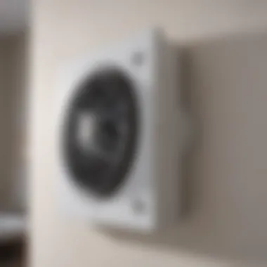 Close-up of a bathroom extractor fan showing its ventilation system