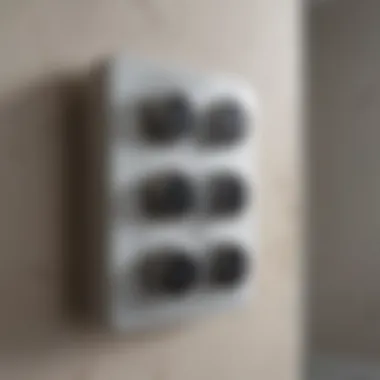 Close-up of Bluetooth speaker controls on a bathroom fan