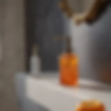 Elegant orange soap dispenser and matching accessories on a sink