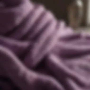 Close-up of soft fabric texture of a purple patterned towel