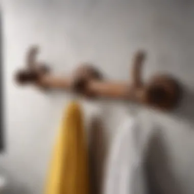 Charming Rustic Wooden Towel Hooks Rustic wooden towel hooks mounted on a bathroom wall