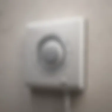 Close-up of a humidistat control on a bathroom fan