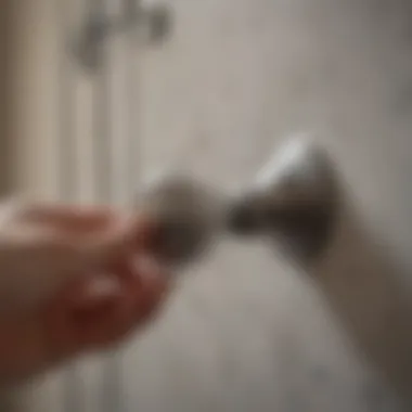 Installation of a bathroom knob in progress